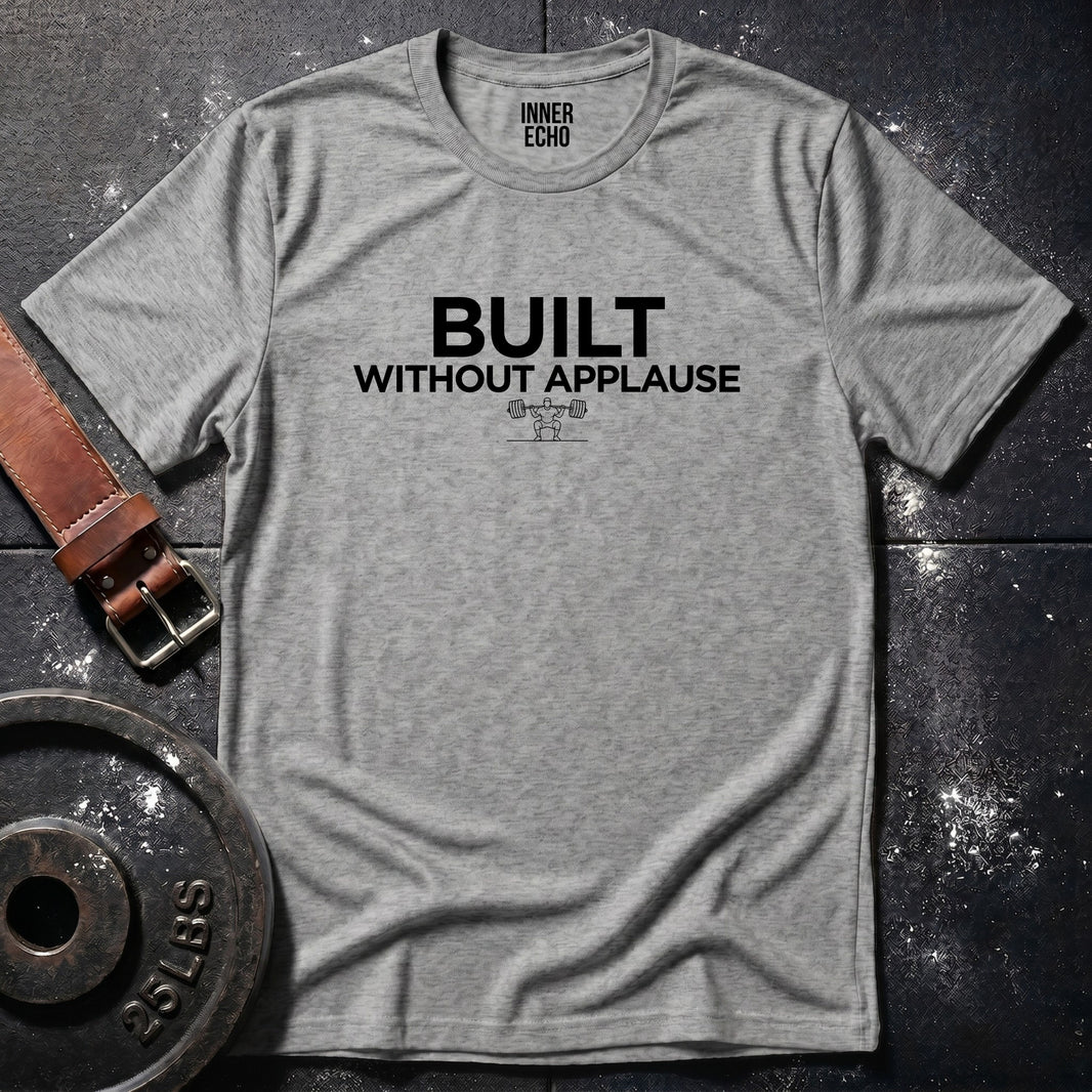 BUILT WITHOUT APPLAUSE — Tee