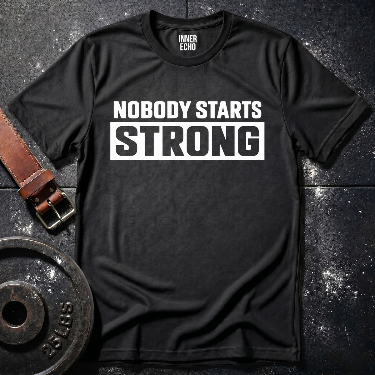 NOBODY STARTS STRONG — T-Shirt