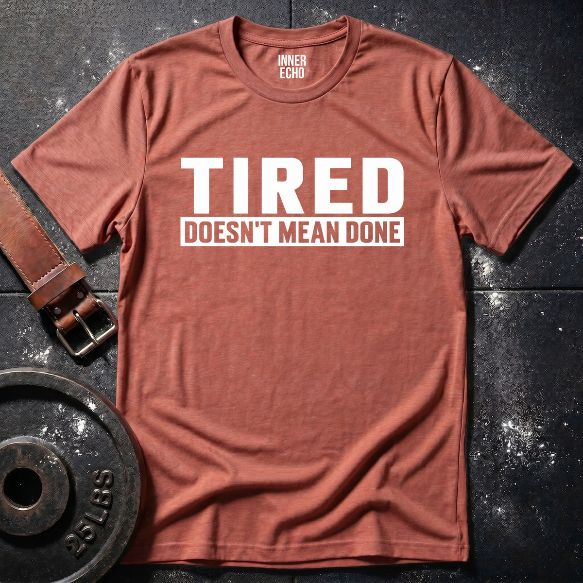 TIRED DOESN’T MEAN DONE — T-Shirt