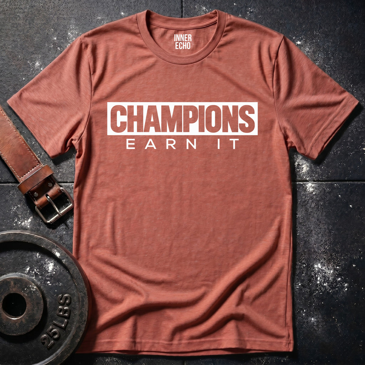CHAMPIONS EARN IT — T-Shirt