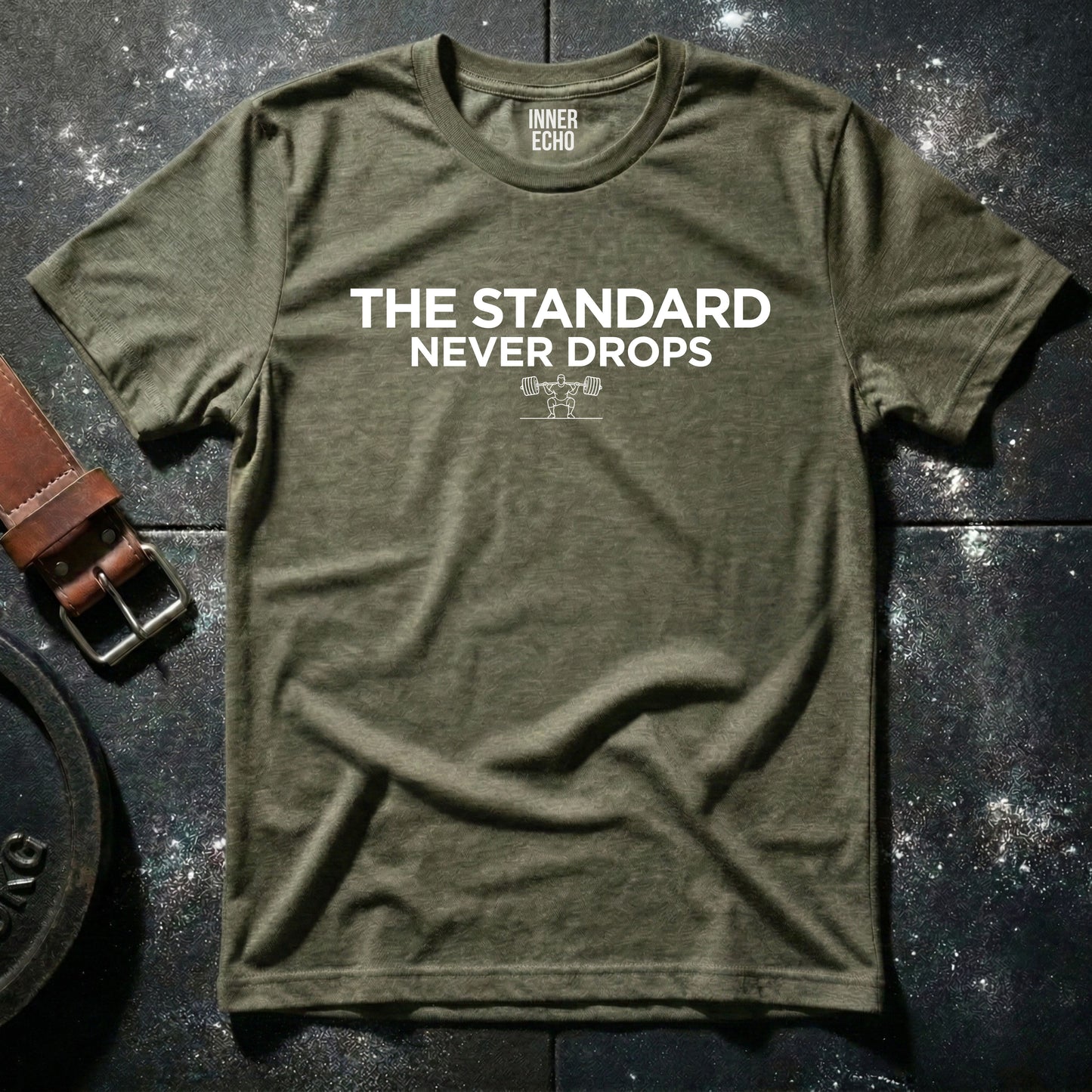 THE STANDARD NEVER DROPS  — T-Shirt