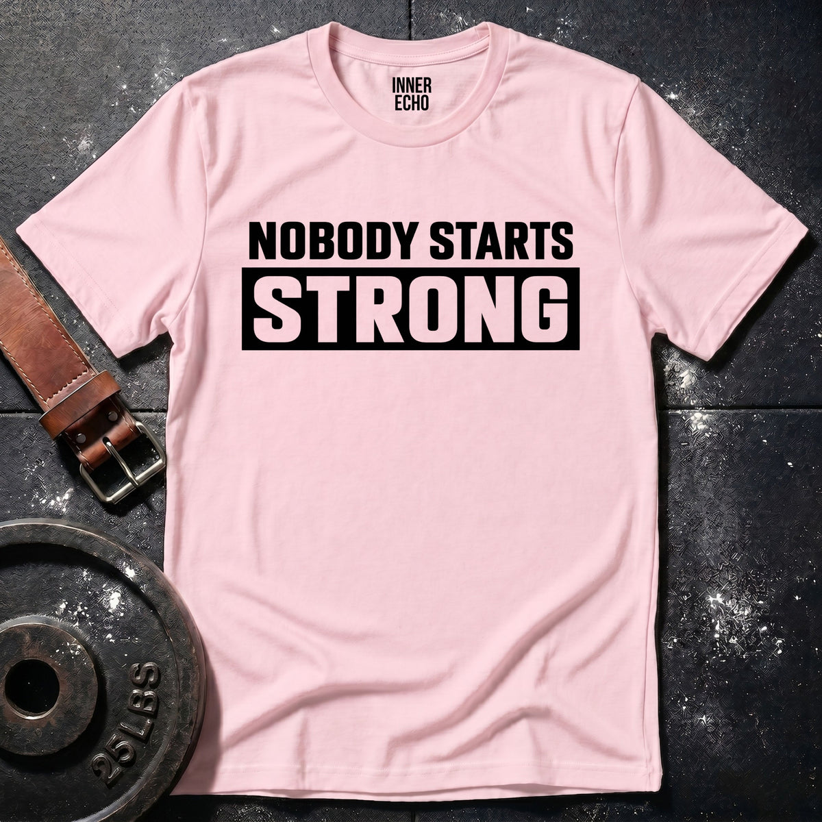 NOBODY STARTS STRONG — T-Shirt